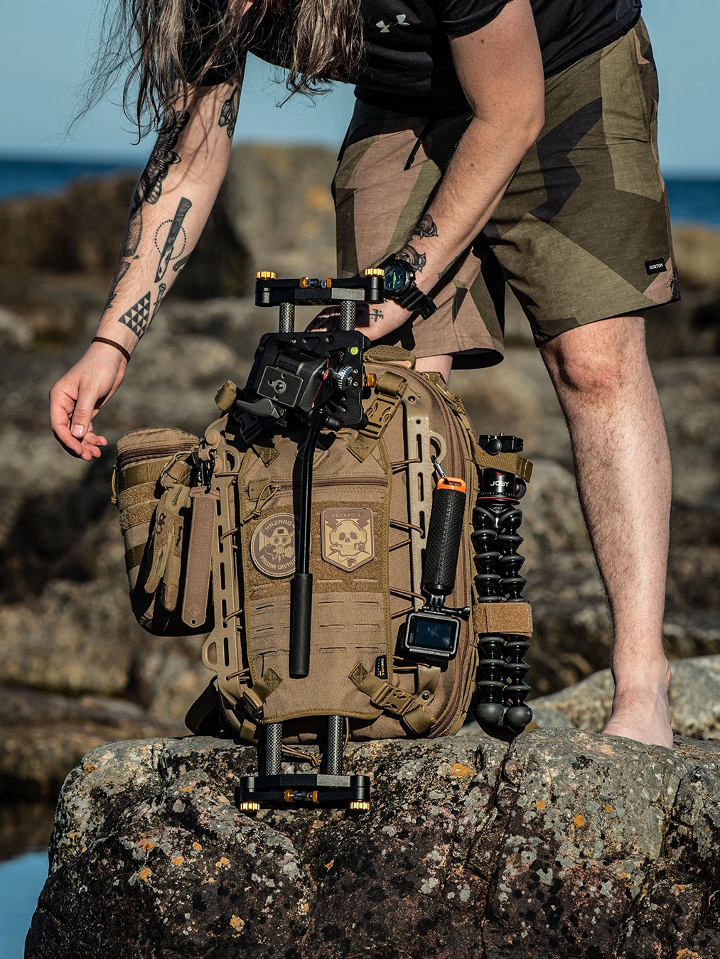 commercial-outdoor-photo-hardshell-backpack-accessories-baltic-sea-rocks-sweden