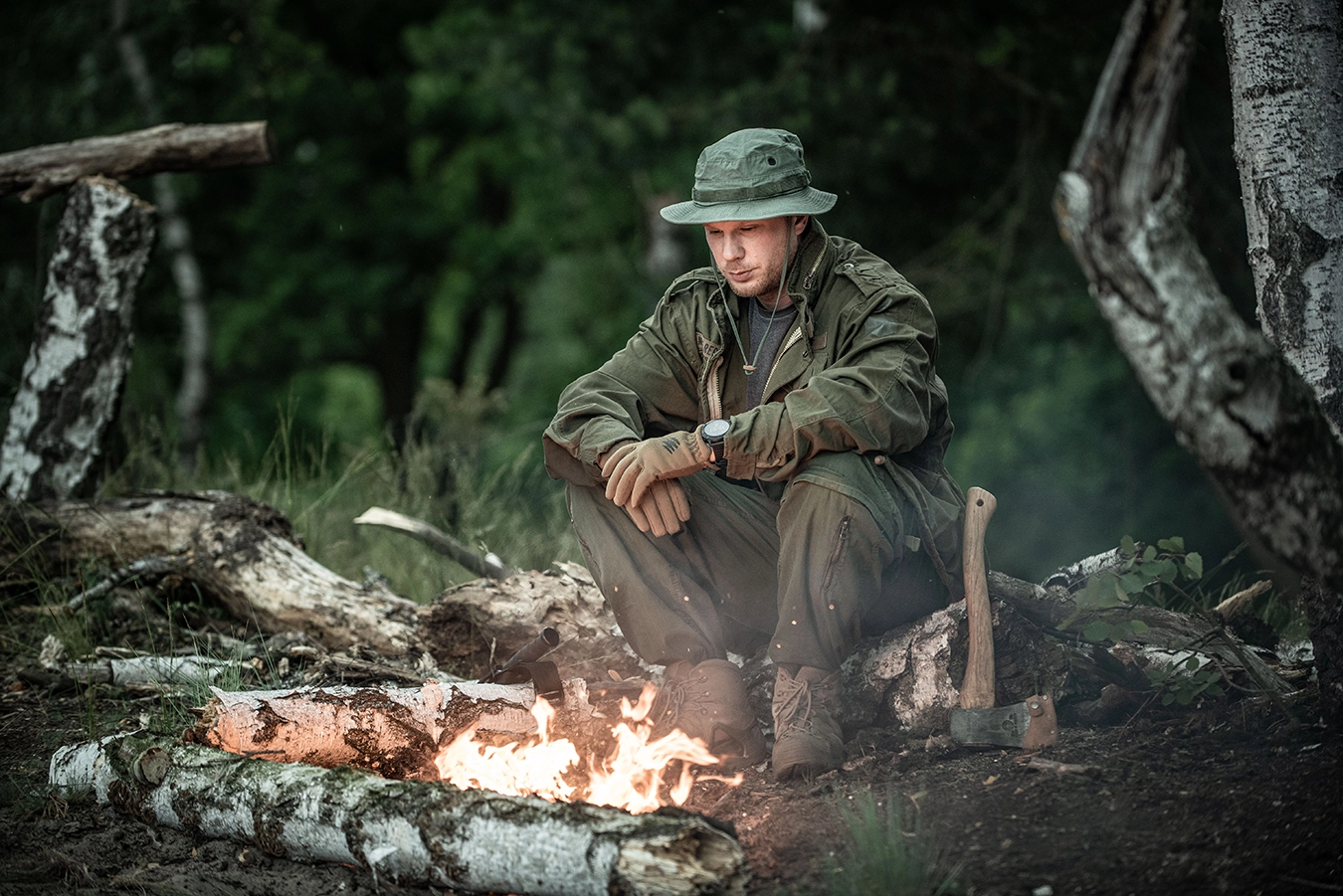 commercial-outdoor-photography-male-fashion-survival-jacket-woods-campfire-poland