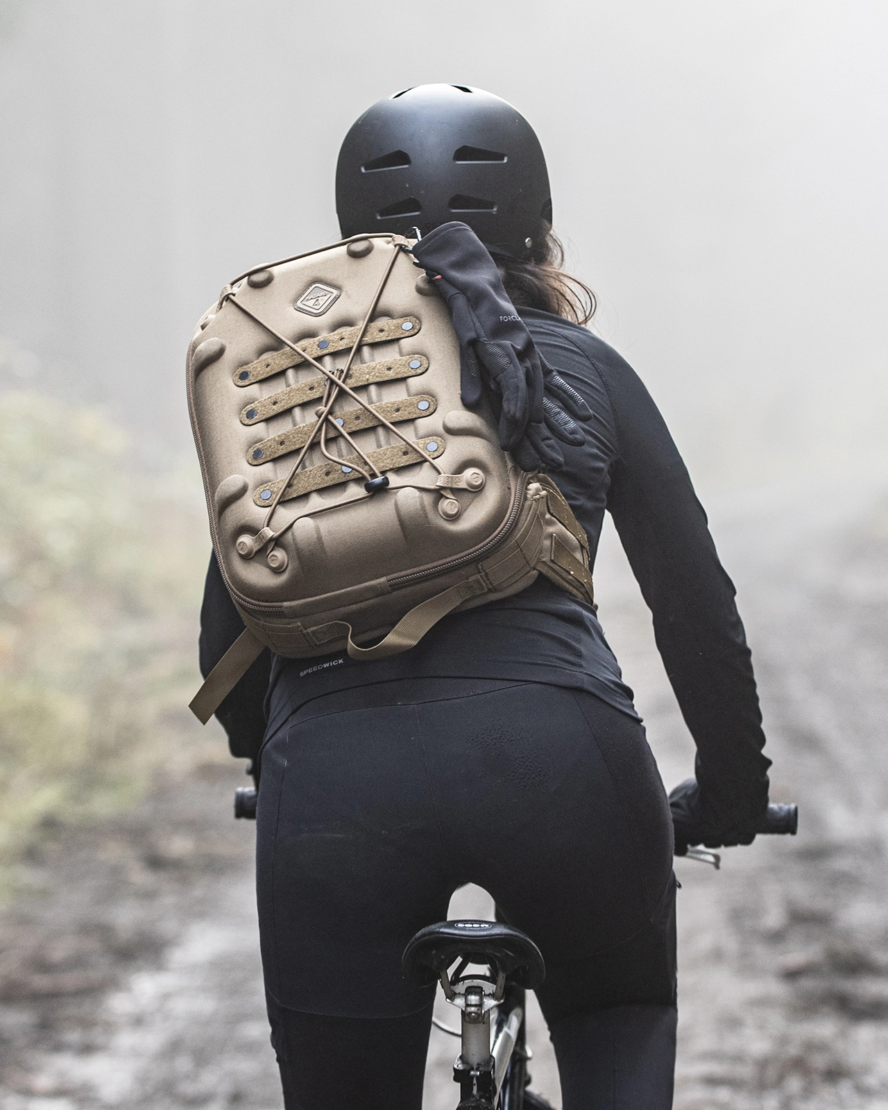 commercial-outdoor-photography-slingpack-cycling-active-lifestyle-mountains-foggy-day