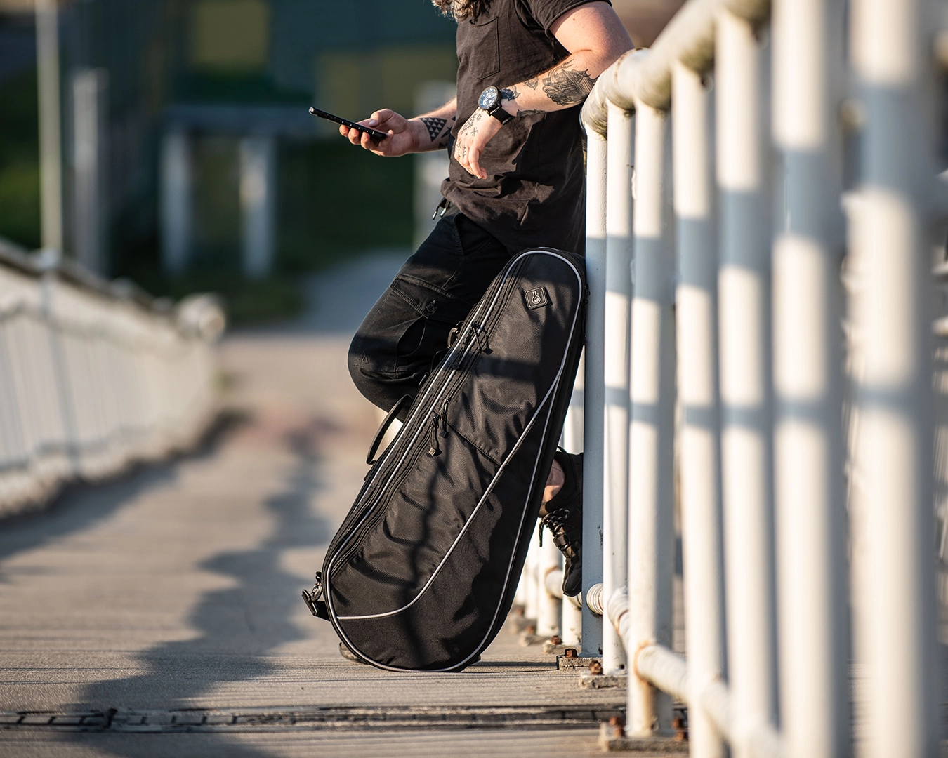 outdoor-gear-photography-tactical-pack-lifestyle-city-bridge-sunset