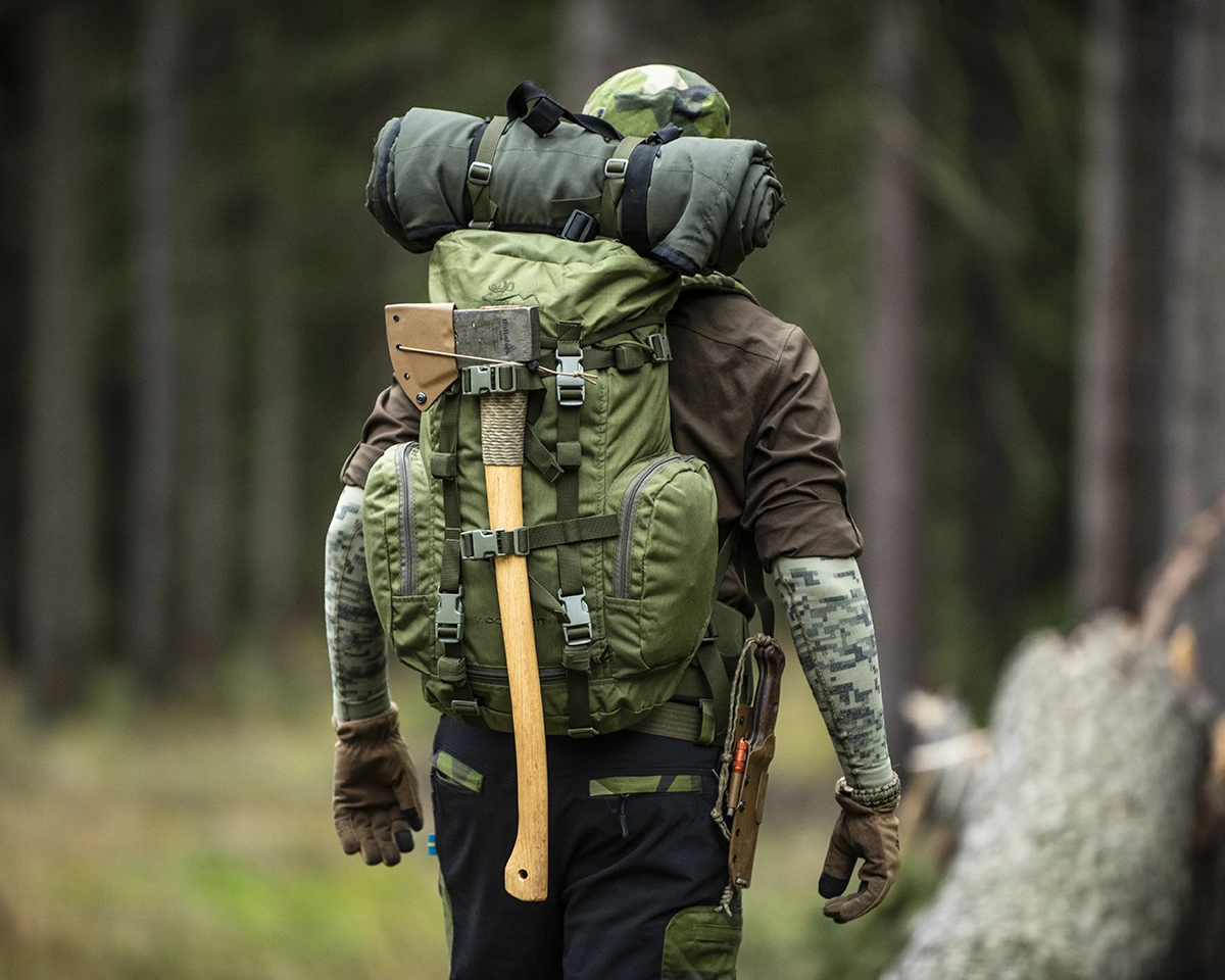 outdoor-product-green-backpack-camping-nature-hiking-woods