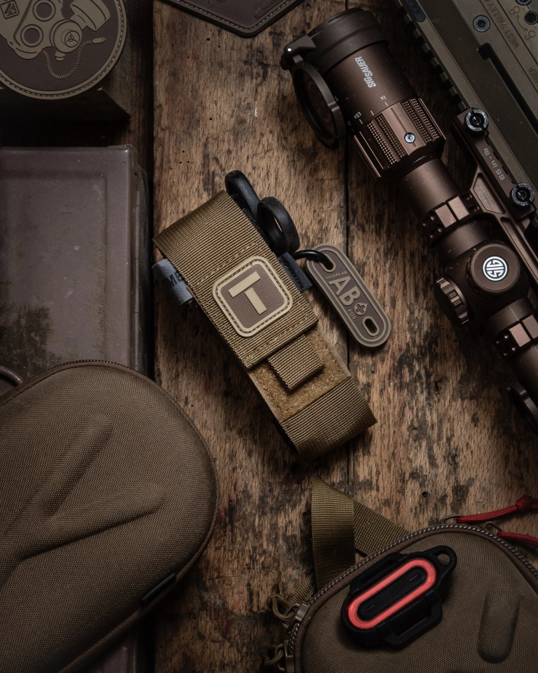 still-life-flat-lay-photo-tactical-edc-tourniqet-pouch-accessories