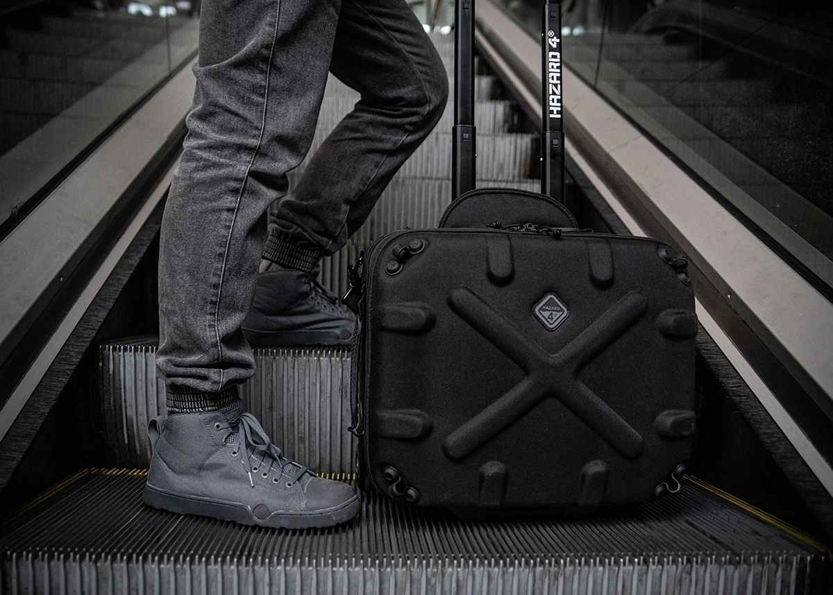 still-life-lifestyle-product-photo-tactical-bag-shoes-escalator-warsaw-poland