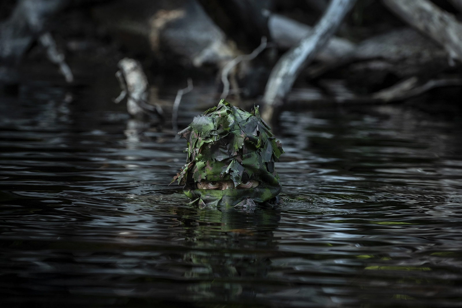 outdoor-tactical-photography-ghillie-emerging-from-water